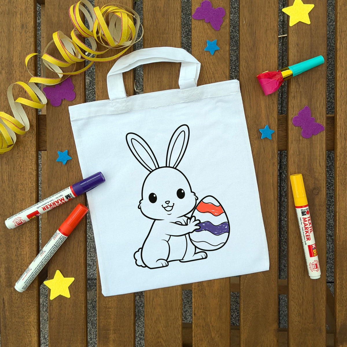 Osterhase mit Ei Ausmaltasche für Kinder, bunt ausgemalt