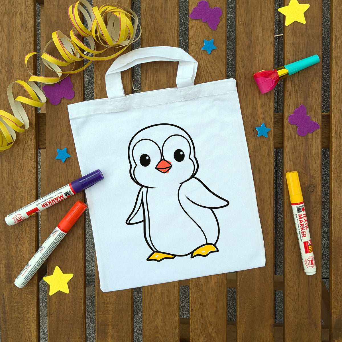 Pinguin Ausmaltasche für Kinder, bunt ausgemalt
